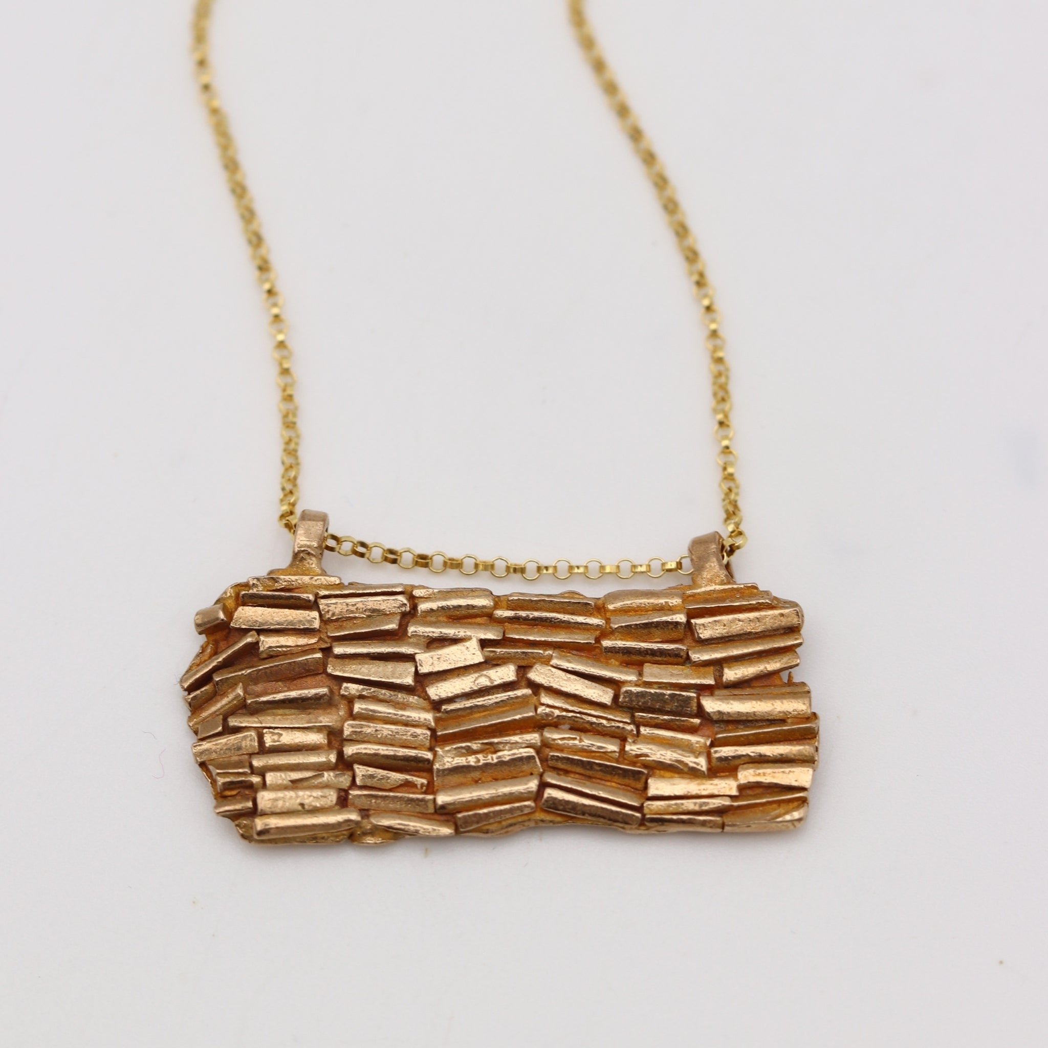 Embellish Necklace in Bronze with Gold Fill Detailing