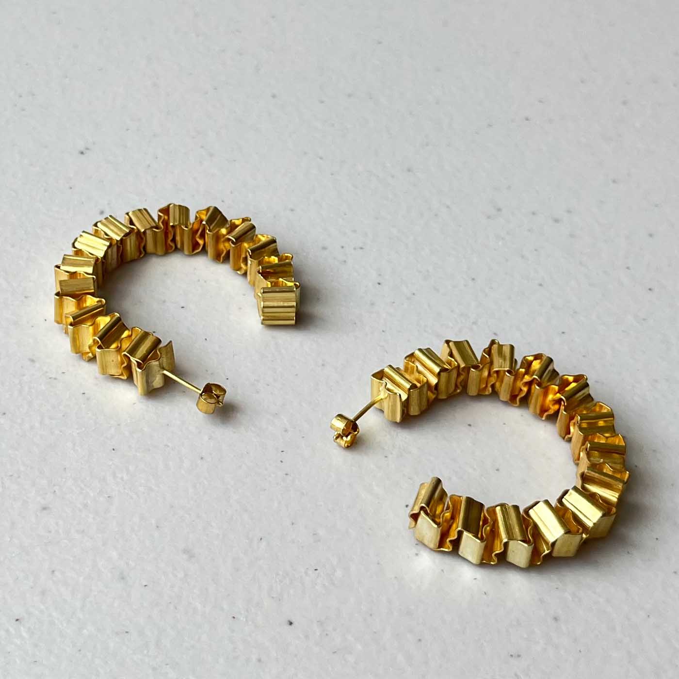 XYZ Hoop Earrings in Hand-Folding Britannia Silver