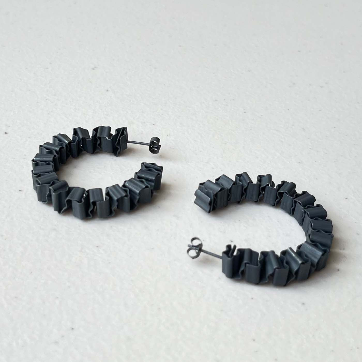 XYZ Hoop Earrings in Hand-Folding Britannia Silver